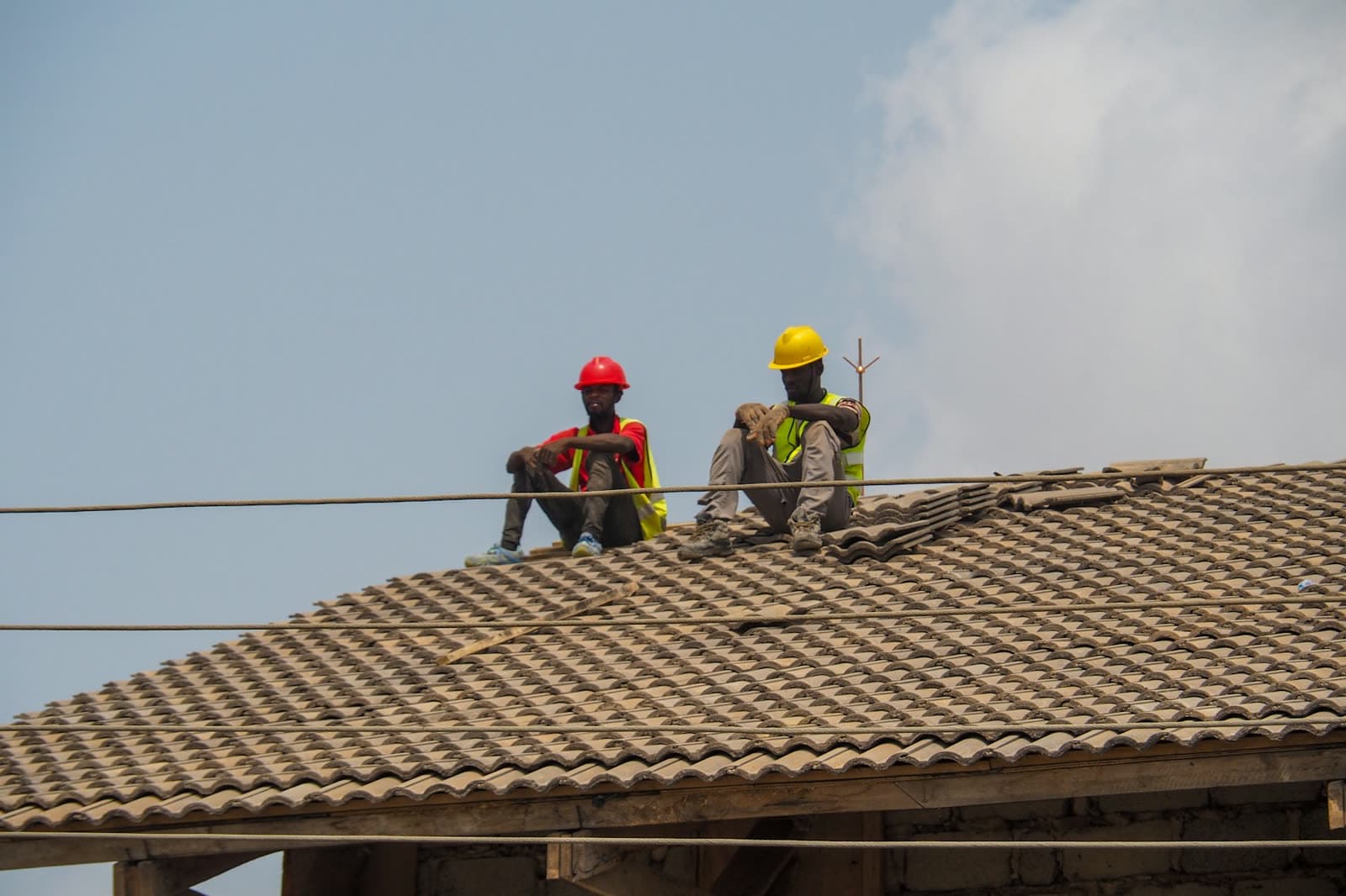 Construction workers on a rooftop site in Accra, Ghana